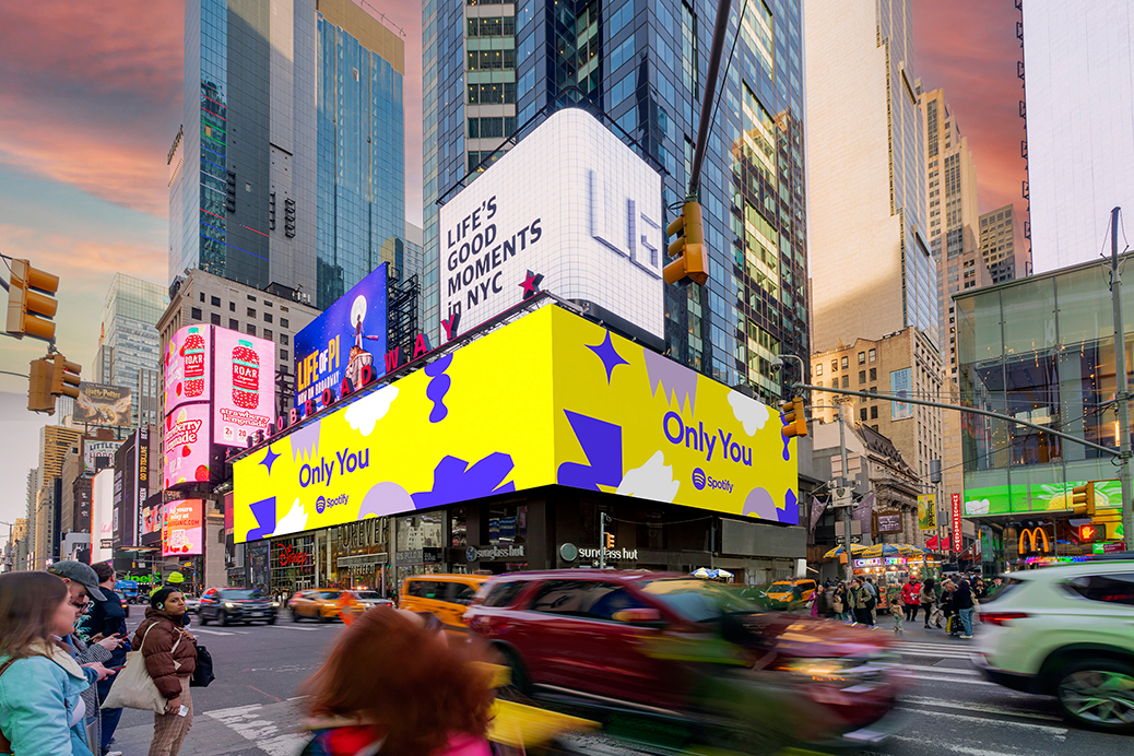 A digital screen in Times Square with a Spotify promotion on it. The screen stretches almost all the way down 7th Ave between 46th and 45th Sts and continues onto 45th St.